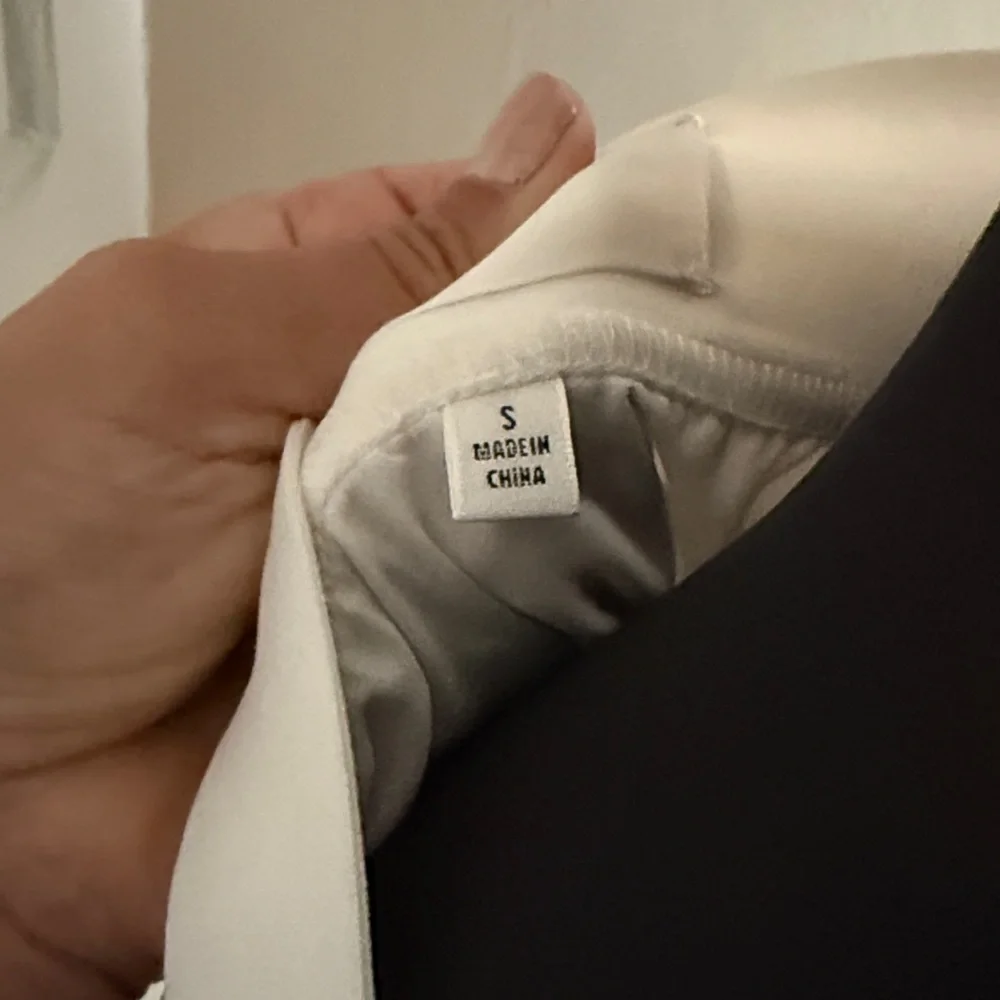 NOT FOR SALE- ARITZIA Elegant White Pleated Skirt - Picture 2 of 6